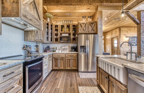 Chalet Village North Cabin | Moonshiners Hideout | Swing Bed, Hot Tub & Mountain Views