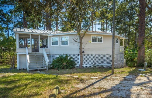 Carrabelle House | Morning Calm is what you will feel at this Very Nice, River Front Home.
