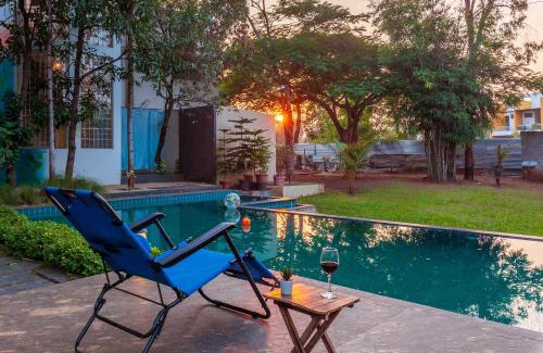 Nashik Villa | Morning Dew Retreat by StayVista - Modern interiors, Indoor games, Lush greenery, Pool & Gazebo await your escape