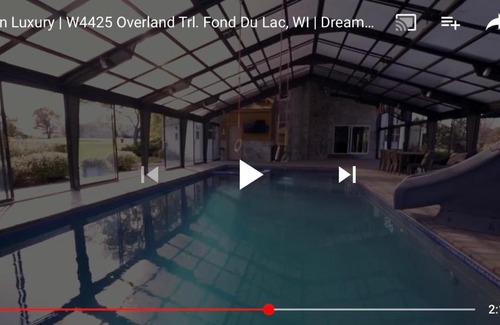 Fond du Lac House | Most Fun Home in Wisconsin: Indoor Heated Pool, Basketball Court, Rock Climbing Wall, Ropes/Obstacle Course, Play-Set, Trampoline, Fire-Pit, Grill, Patio, 84 inch TV, and so much more!