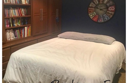 Fond du Lac House | Most Fun Home in Wisconsin: Indoor Heated Pool, Basketball Court, Rock Climbing Wall, Ropes/Obstacle Course, Play-Set, Trampoline, Fire-Pit, Grill, Patio, 84 inch TV, and so much more!