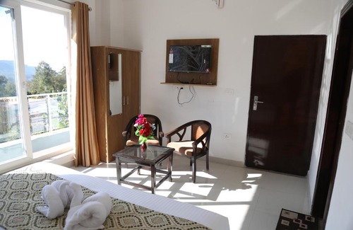Tapovan Apartment | Mountain Facing Room by yog Tapovan