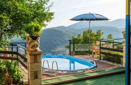 Lepreo Apartment | Mountain Oasis - Pool & Playground near Neda Falls