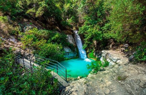 Lepreo Apartment | Mountain Oasis - Pool & Playground near Neda Falls
