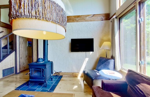 North Creek House | Mountain Top Cabin | House in Wevertown with a hot tub & a woodstove