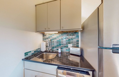 Taos Cottage | Mountain-view casita with hot tub, pickeball court, walking labyrinth & orchard