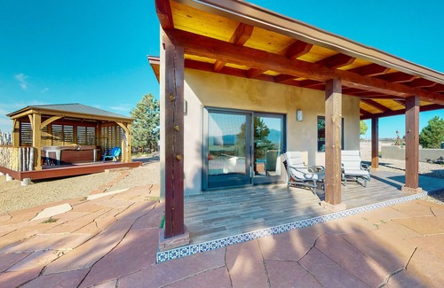 Taos Cottage | Mountain-view casita with hot tub, pickeball court, walking labyrinth & orchard