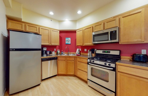 Alyeska Condo | Mountain-view condo with private hot tub, fireplace, deck, W/D