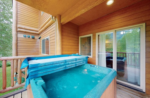 Alyeska Condo | Mountain-view condo with private hot tub, fireplace, deck, W/D