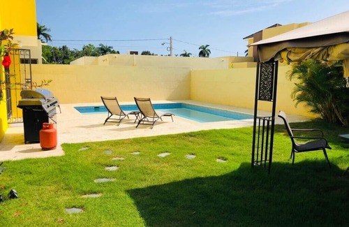 Munoz House | Mountain view country side house near the famous playa dorada resorts complex.