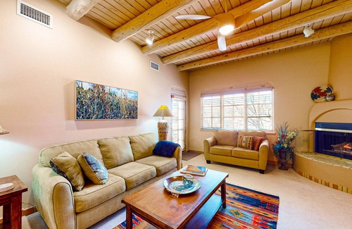 Quail Run Condo | Mountain view home with pools, hot tub, gym, tennis, & golf - long term rental