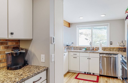 Warren House | Mountain-view home with new deck, fireplace, W/D, & shared pool - walk to lifts