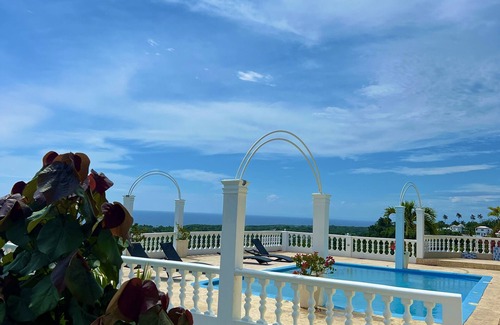 Cabrera Apartment | Mountain view suite with balcony, pool, sitting area, & more- close to beach!n