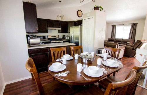 Cheyenne Meadows House | Mountain-View 5BR Retreat: Gym, Hot Tub, BBQ, Firepit, Playground, Sleeps 12