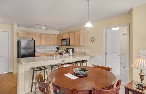 Steamboat Springs Condo | Mountain-view condo with pool, hot tub, gym, private gondola, game room, firepit