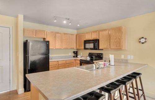 Steamboat Springs Condo | Mountain-view condo with pool, hot tub, gym, private gondola, game room, firepit