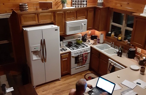 Unaka Cabin | Mountain views located on private lake all wood 3 story cabin.