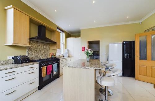 Newry House | Mourne Mountain Bliss, Rostrevor 4BR Cottage with Patio & BBQ ideal for a relaxing getaway