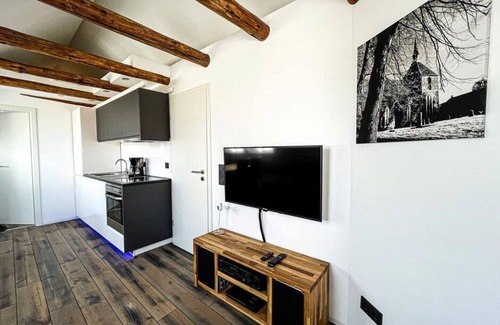 Rysum Apartment | Mühlenkieker apartment in the historic terp village of Rysum in the immediate vicinity of the North Sea