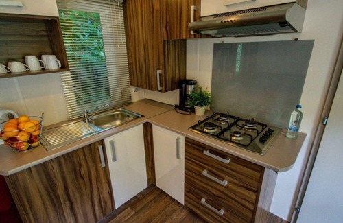 Luxembourg Ardennes House | Mullerthal Deluxe mobile home, Resort Walsdorf, 4 guests, garden with sun loungers. Perfect for families.