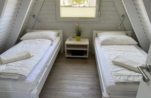 Carolinensiel House | Murmel 1 - Strandkorb, Wallbox, WLan, Kamin