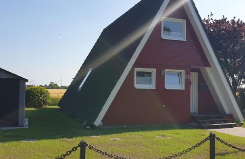 Carolinensiel House | Murmel 3 - Strandkorb, Wallbox, WLan, Kamin