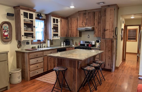 Breaux Bridge Cabin | "My Playhouse" Enjoy the country views from the wrap around screened porch