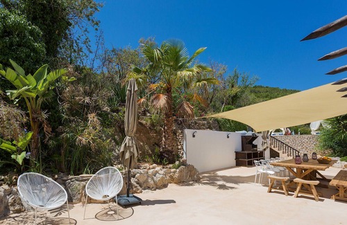 Sant Joan de Labritja Villa | My Rental Homes - Finca Bering surrounded by lush vegetation with private pool