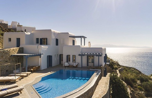 Psarou Villa | My Rental Homes - Villa Anassa: pool and private dock (possibility of boat rental)