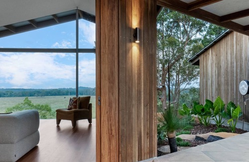 Myocum House | Myocum Ridge Farm - A winding driveway, cows, blue skies, manicured lawns, glittering pool