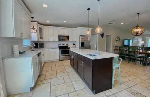 Butler Beach House | Mystical - Relaxing Heated Pool and Stylish Comfort, Pet Friendly!