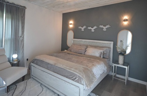 Waco House | Mystical Stays: The Owl & Moon, Group Trip, King Bed, Themed Stays. 3+2