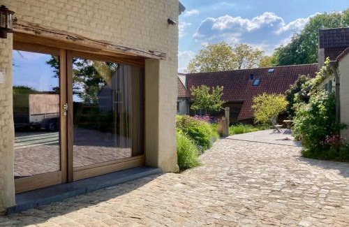 Kluisbergen House | Nachtegael Poorthuis. Een ruime, lichte woning in loft stijl.