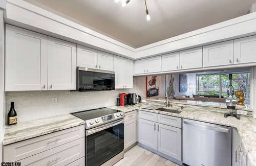 Imperial Golf Estates Condo | NAPLES 2B/2B IMPERIAL CONDO W/STYLE & LAKE VIEWS! POOLS! NEAR EVERYTHING! 102