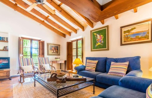 Maria de la Salut Villa | Natural stone villa, cosy interior.