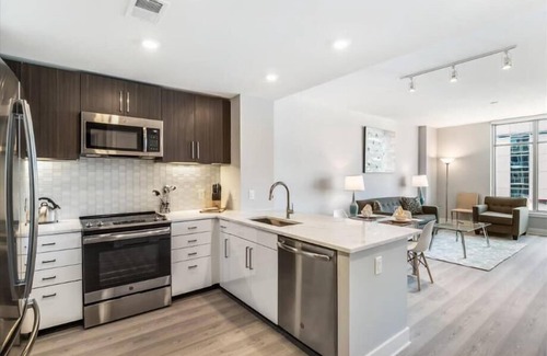 Woodmont Triangle Apartment | Near Chevy Chase | Kitchen w/USB Charging | Take Metro to DC | by GLS