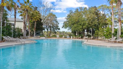 West Panama City Beach House | Near Inlet Beach AccessLake Powell Pool Patio Lounge GDay 30A by AvantStay