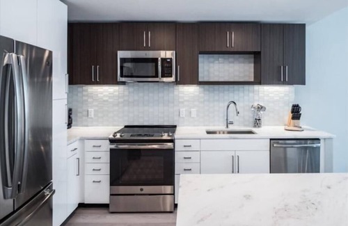 Woodmont Triangle Apartment | Near NIH, Metro & Shops! Spa + Terrace | Near DC | by GLS