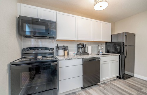 Wichita Apartment | Nearby Downtown! Stacked W&D + Pullout Sofa