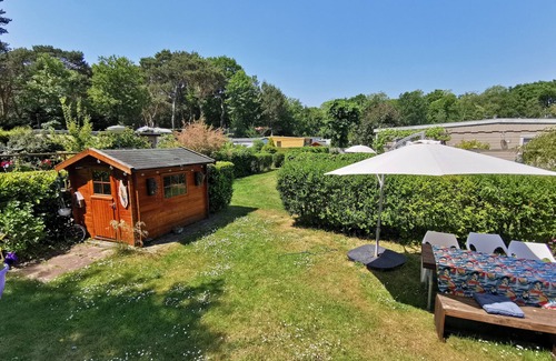 The Hague Ski Chalet | Neat chalet on child-friendly campsite close to beach, town, dunes and forest.