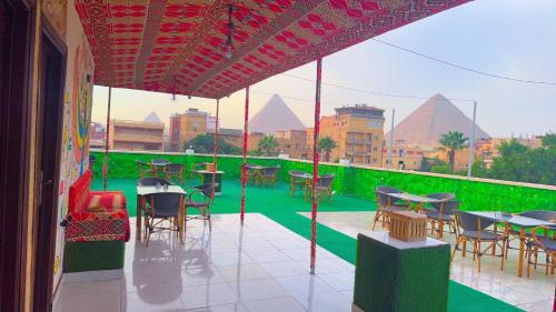 Kafrat al Jabal Hotel | Nefertiti city center Pyramids View