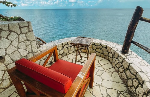 Orange Bay House | Negril Bungalow Paradise overlooking cliffs with Private Snorkeling Entrance.