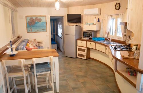 Bindua Apartment | Nel verde del Villaggio - Casetta Celeste