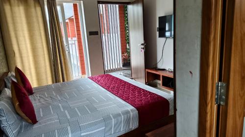 Thalassery Hotel | Nelleri Residency Managed By Vaishno Hospitality