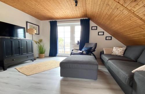 Neßmersiel Apartment | Nessmersiel, Ferienwohnung mit Balkon in Deichnähe, Wallbox, renoviert