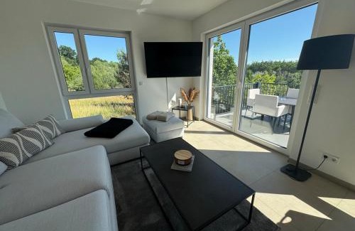 Muldestausee Apartment | neue 90qm Ferienwohnung mit 3 Schlafzimmern in Seenähe