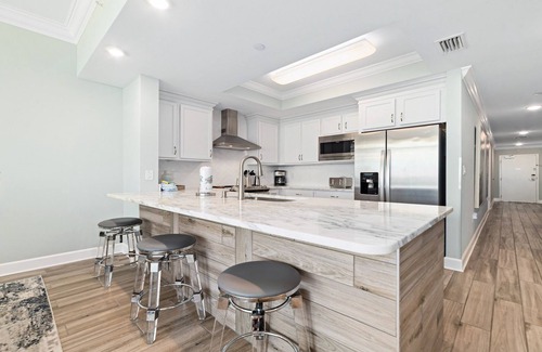 Orange Beach Condo | New Beachfront Condo with Lazy River and Slide!