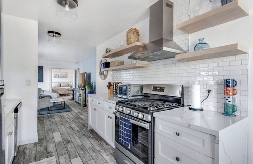 The Strand House | New | Clean | Steps To The Beach | Ocean Breeze!