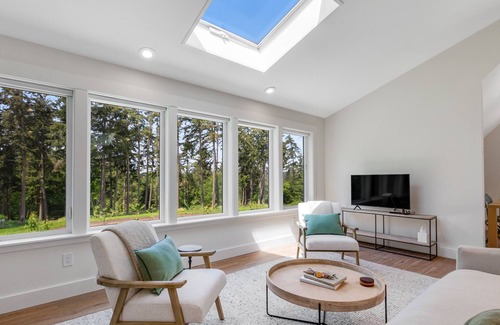Freeland Cottage | New construction - upper-level home with expansive deck & orchard views
