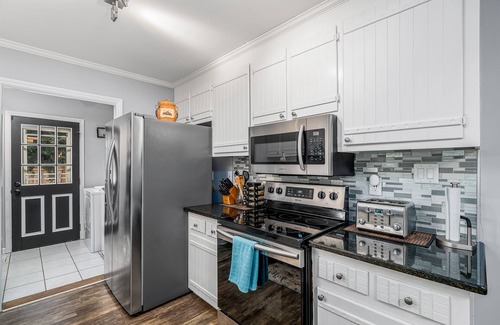 Northeast Raleigh House | NEW! Cozy Raleigh Home w/Porch & Fenced yard-Mins to Downtown ! *pet friendly*